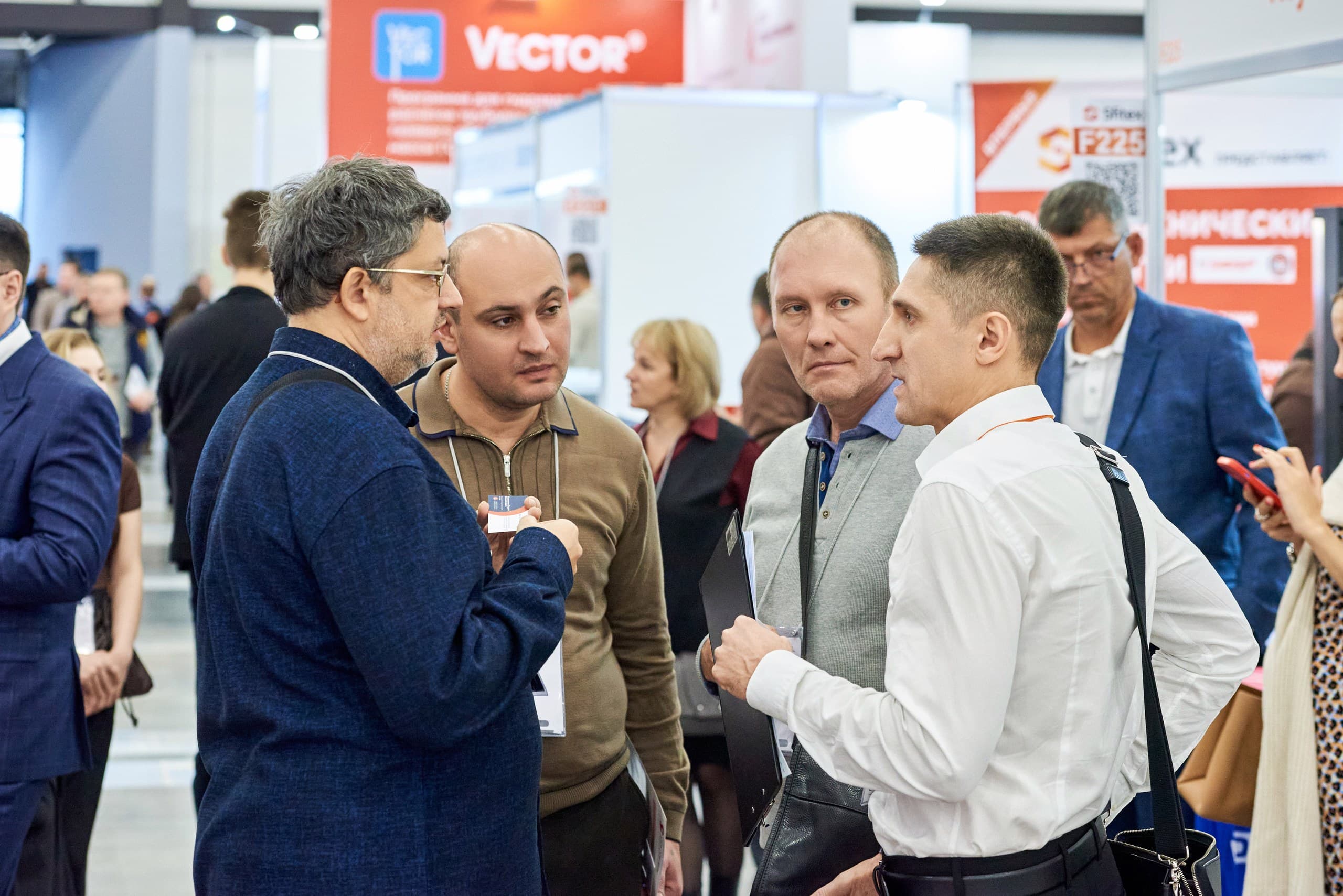 Visitors networking in the Sfitex exhibition hall.